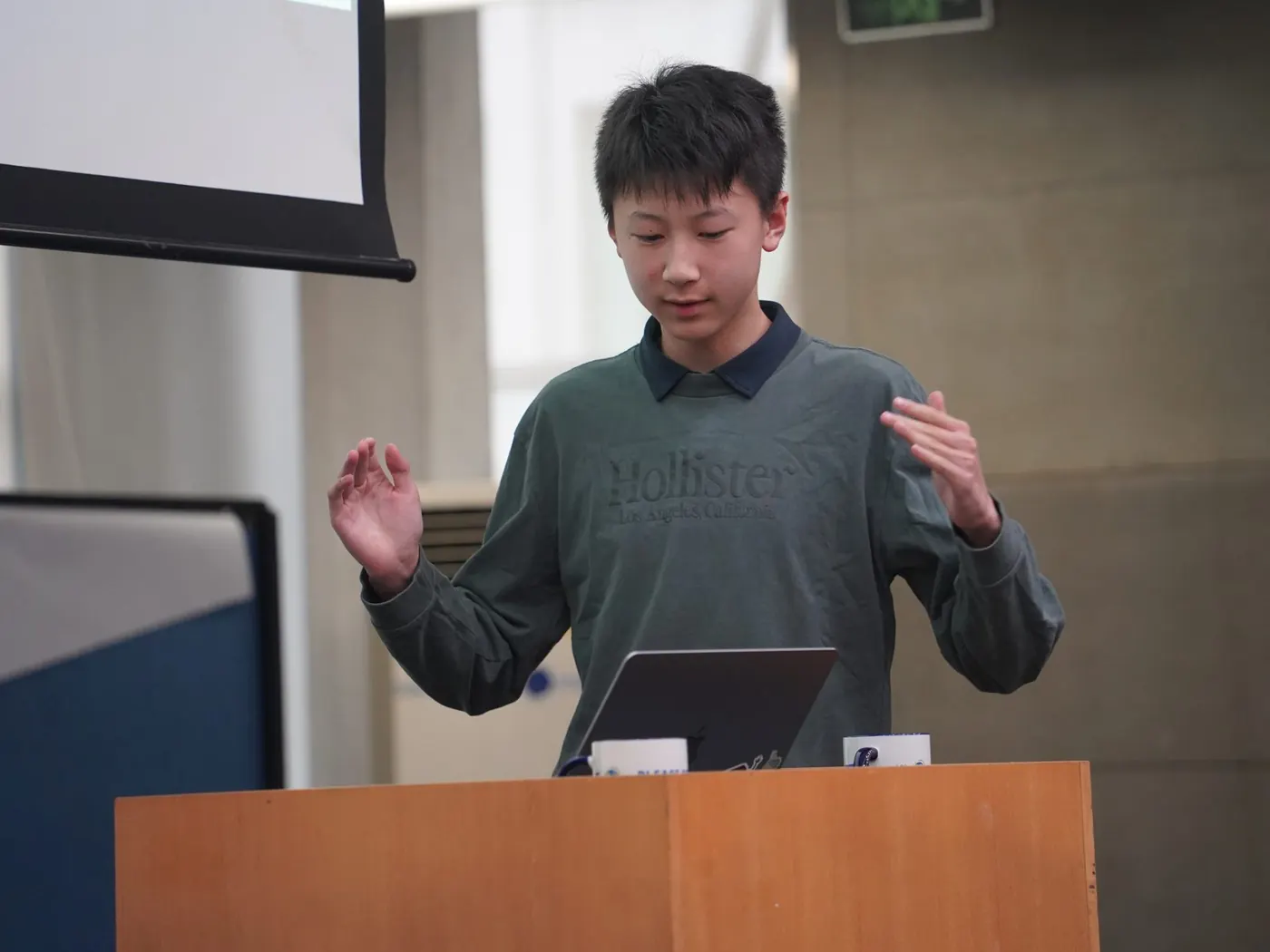 A student pitches his product on demo day