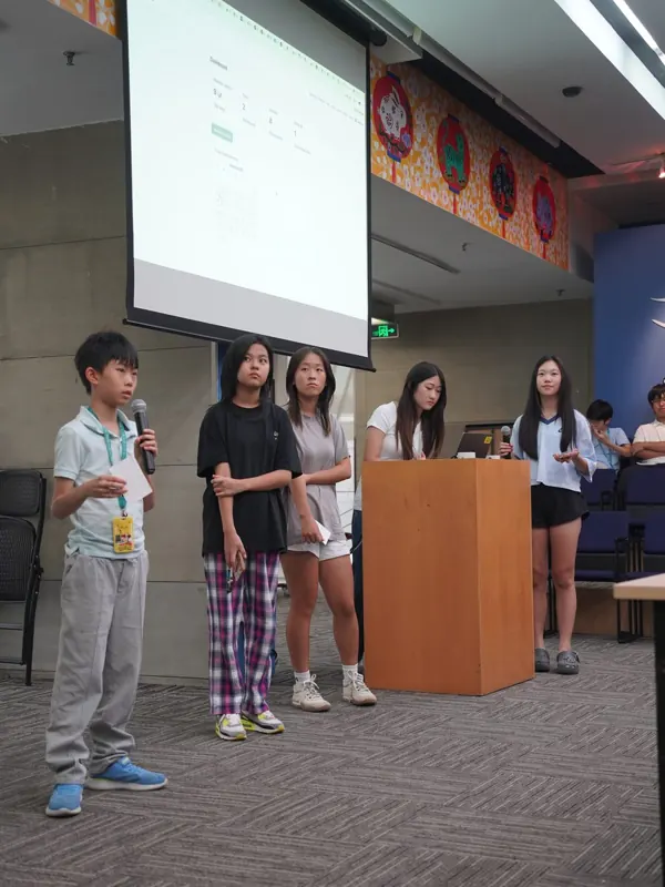 ISB students presenting on stage, Beijing 2026